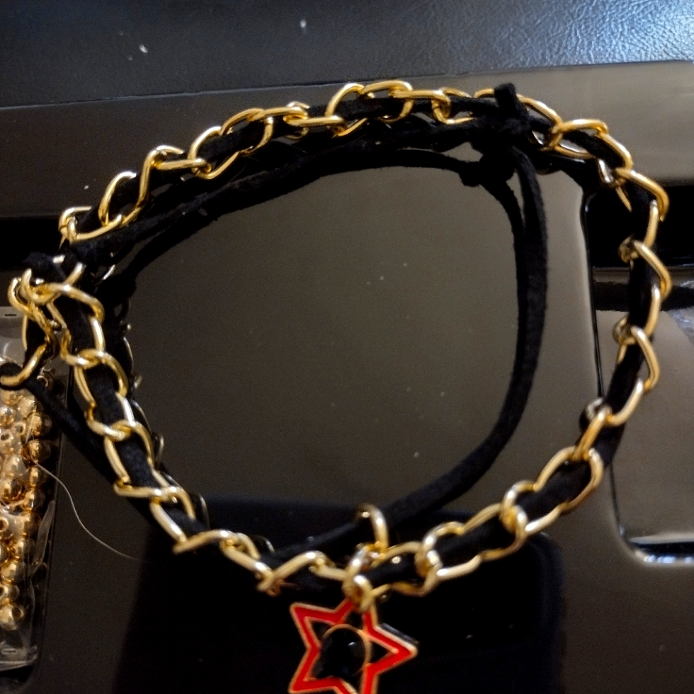 Chain Bracelet With Black Designs And Charms